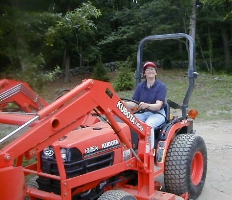 Linda on her tractor